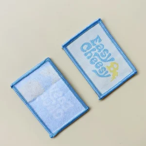 Custom Woven Patches for Hats and Clothing with Merrow Border - Imagen 3